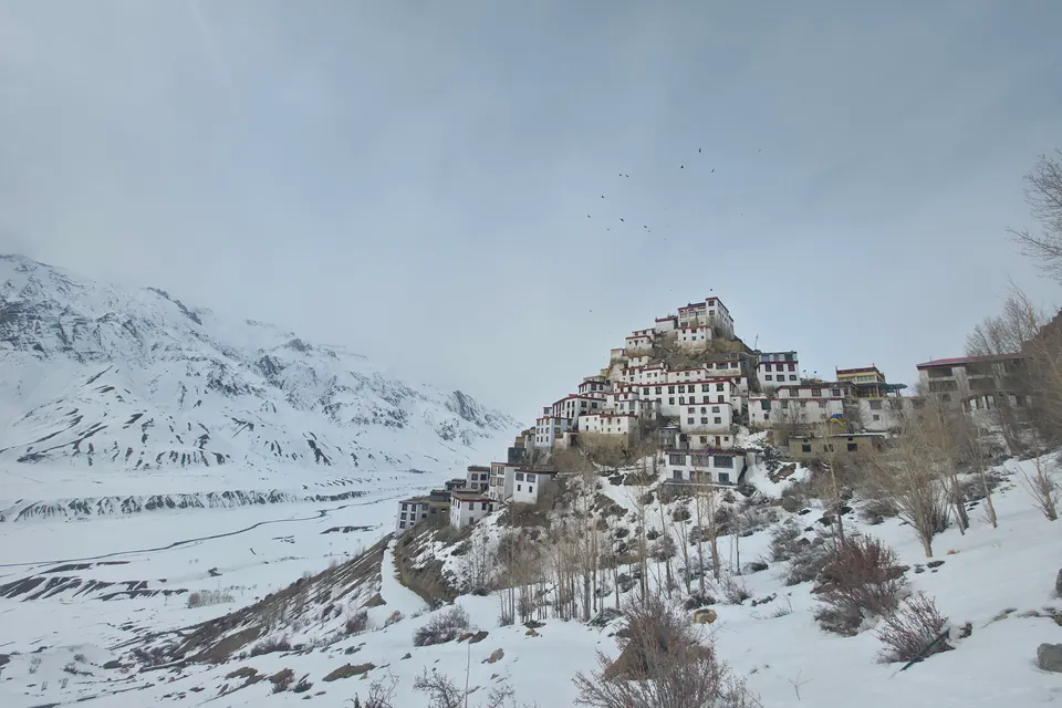 Stunning winter scene of Key Monastery surrounded by snow in Spiti Valley, Himachal Pradesh, India.