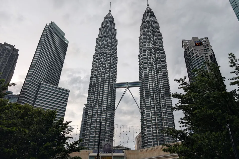 Stunning view of the Petronas Twin Towers in Kuala Lumpur, Malaysia. Iconic modern architecture.