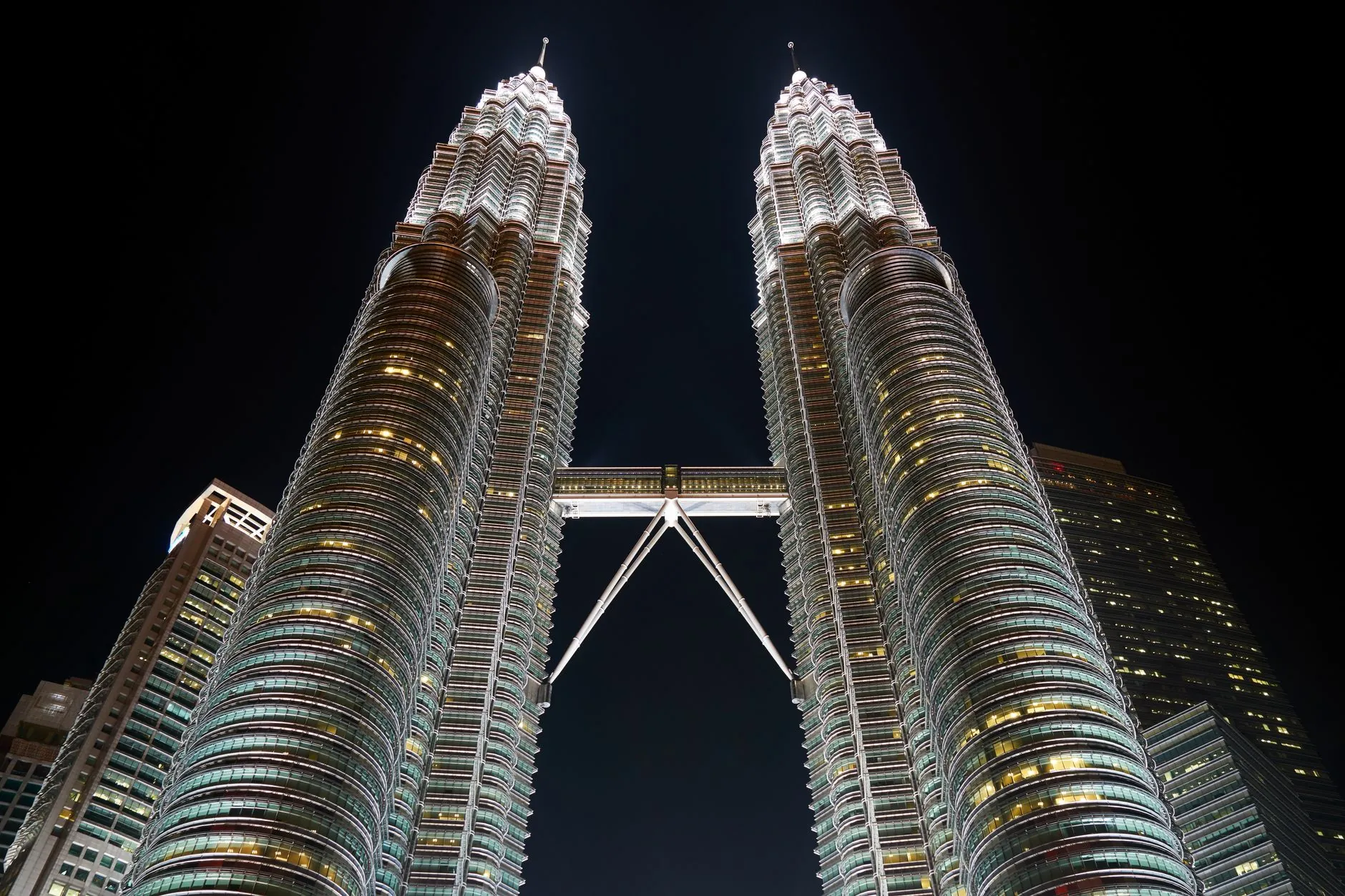 Magnificent view of Petronas Twin Towers in Kuala Lumpur, Malaysia at night.